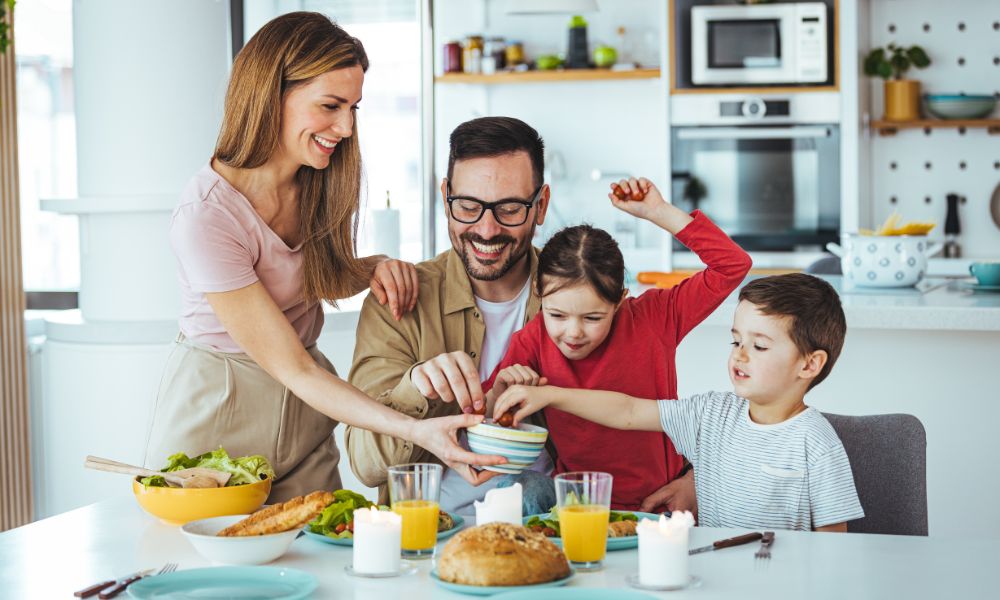 young family having a healthy christmas lunch 